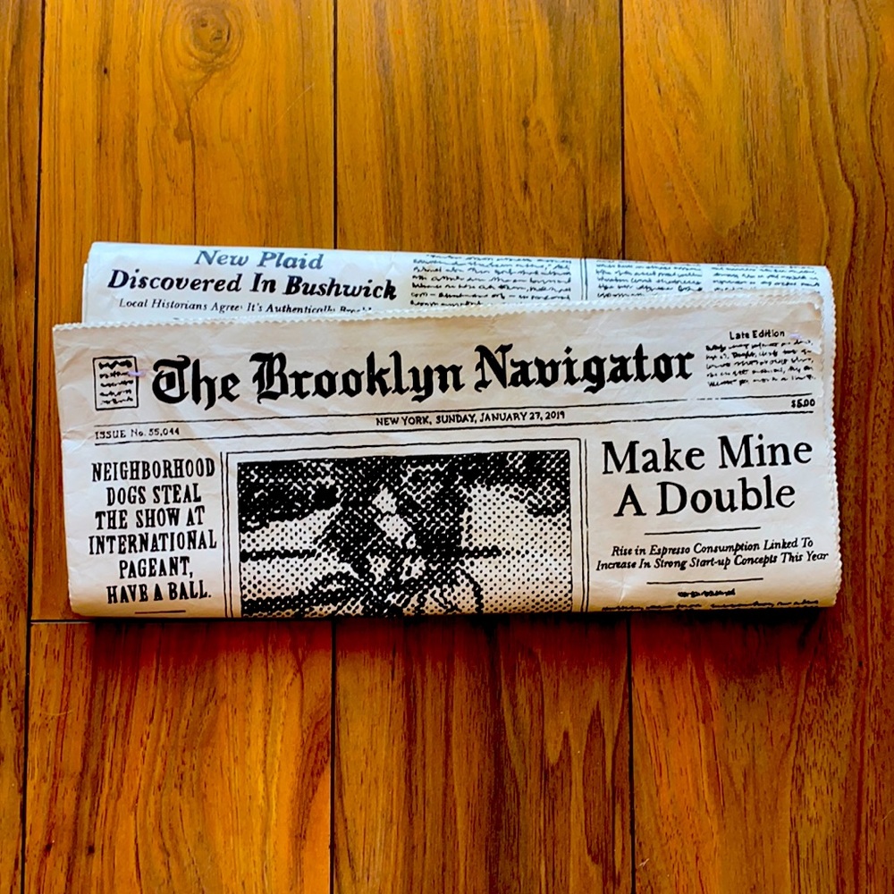 Kate spade newspaper novelty clutch